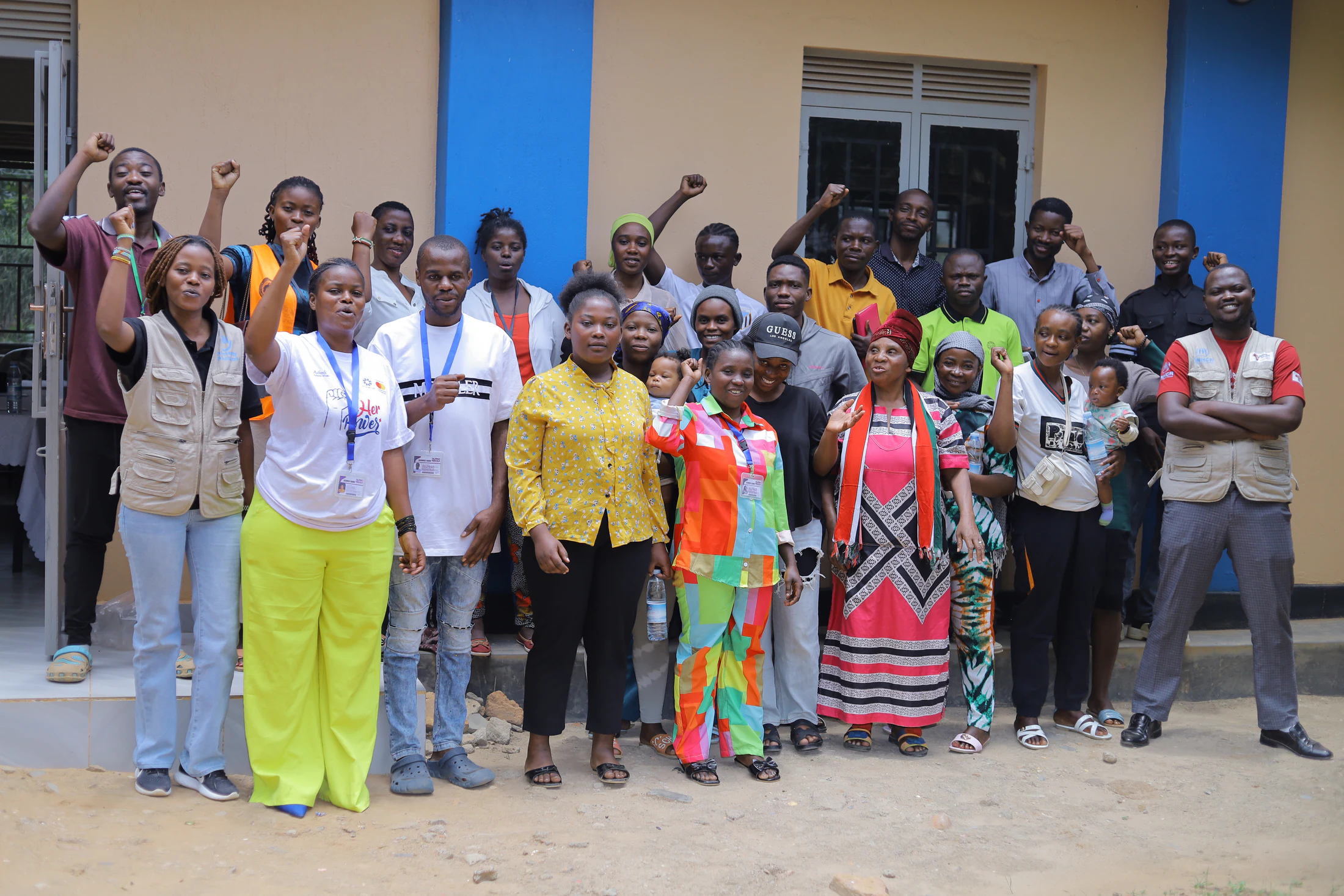 Community partners celebrating together outside an Alpha Female venue